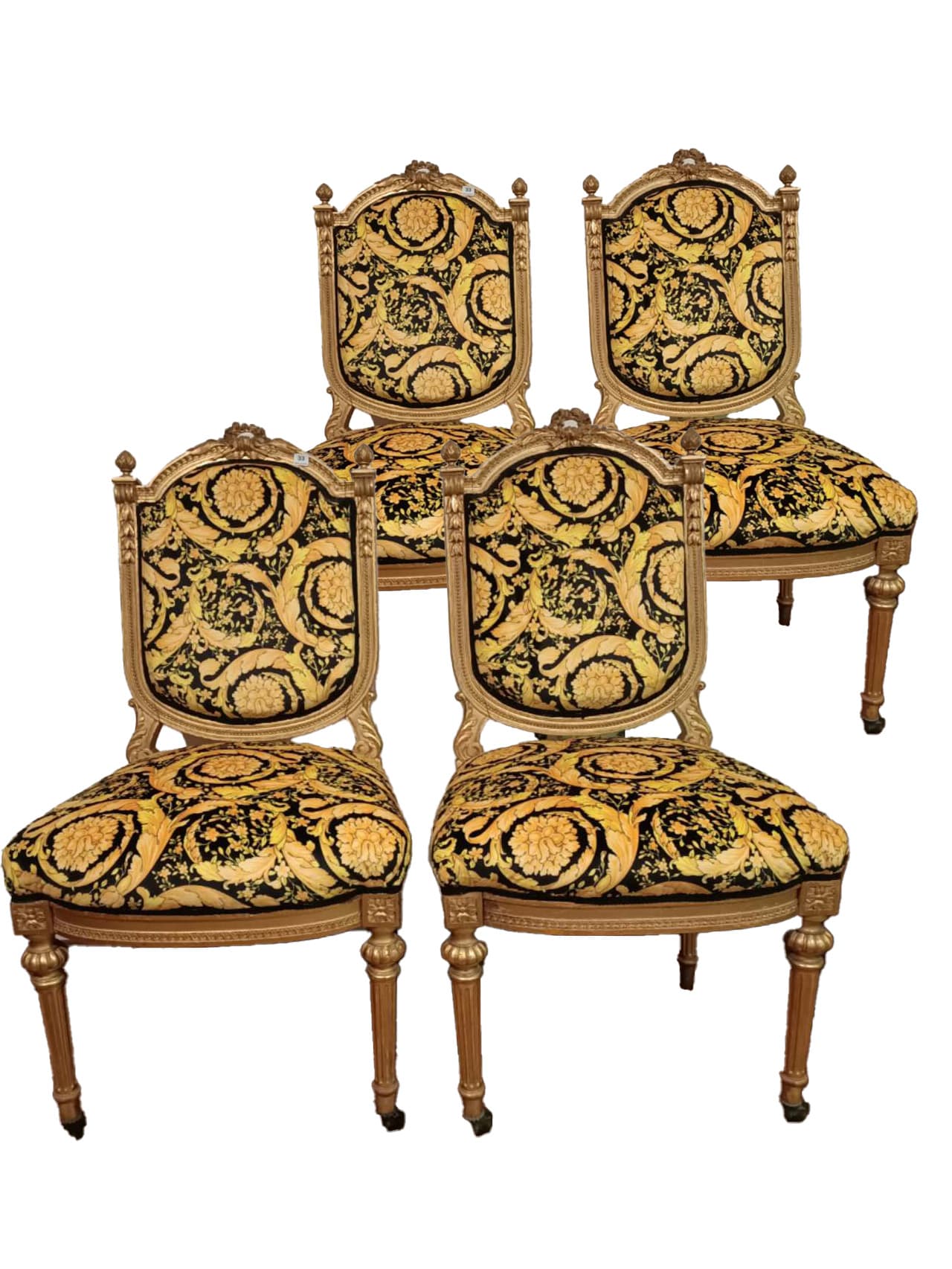 A pair of Louis XV the gold framed versace fabric upholstered bedroom chairs